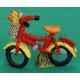 Figura bicicleta roja tradicional con cesta de flores